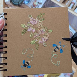 book flower with bee
