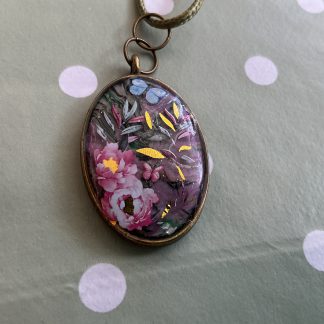 Floral oval butterfly necklace