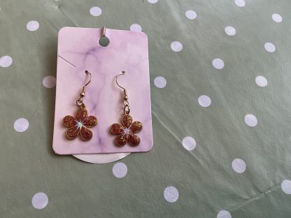earring flower orange with gold flakes