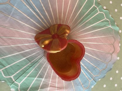 red and orange heart pot with lid