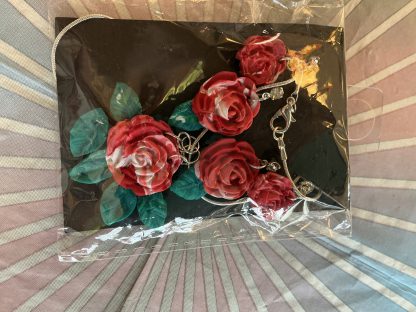 necklace set red flowers and green leaves