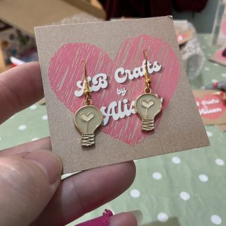 pink light bulb earrings